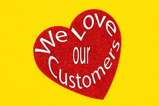 We love our customers message on red heart