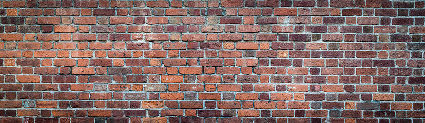 Brown and Red brick wall. Texture of old weathered brick wall panoramic backgorund.