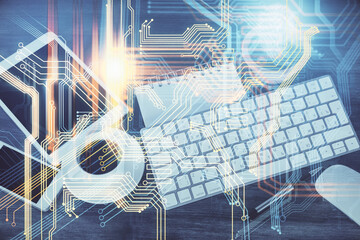 Double exposure of map hologram drawing over desktop. Top view. International connection concept.