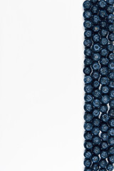 nature and healthy food concept - Top view of fresh blueberries isolated on white background. Copy space.