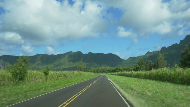 Driving POV towards the Haupu mountain range on Kauai, Hawaii.