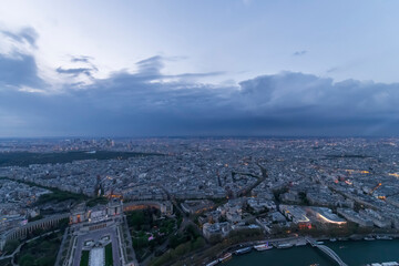 Fototapeta premium Panorama of Paris in the evening from the height of bird flight at sunset