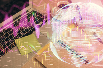 Multi exposure of forex graph drawing and desktop with coffee and items on table background. Concept of financial market trading