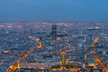 Panorama of Paris in the evening from the height of bird flight at sunset
