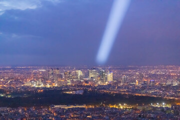 Panorama of Paris in the evening from the height of bird flight at sunset