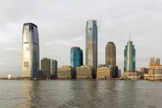 Jersey City, NJ / United States - Dec. 27, 2019: A landscape image of Jersey City and other buildings at  Exchange Place.