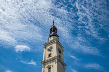 Fototapeta na wymiar Old town hall amid the sky, Poland. Architecture of the ancient city