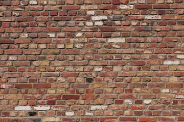 Real vintage Bumpy, rough and old brick texture with imperfect, dilapidate, impair, corroded and...
