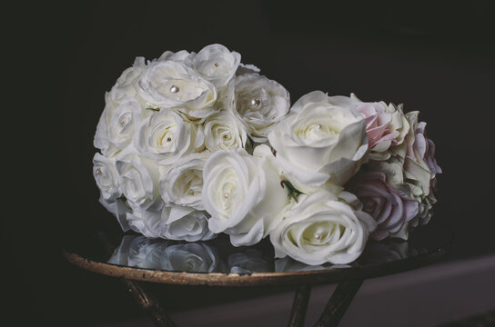 White rose bouquet on bacl background 