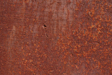 Deep Red Rusty iron or steel texture and surface. Vintage and industrial concept, Rust on metal material with scratch and bumpy surface.  