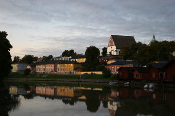Fototapeta na wymiar View of church from across river in Prorvoo, Finland