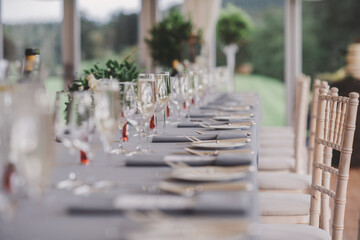 Top table set for wedding with grey tablecloth