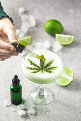 CBD Cocktail with cannabis infused superfood powder and CBD tincture. Use for a relaxing buzz and restful sleep. Alternative medicine and smokeless consumption of cannabis.