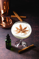 CBD Cocktail with cannabis infused superfood powder and CBD tincture. Use for a relaxing buzz and restful sleep. Alternative medicine and smokeless consumption of cannabis.