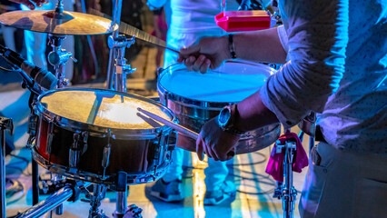 Fototapeta na wymiar Cuban musician playing drums on the stage, Havana, Cuba.