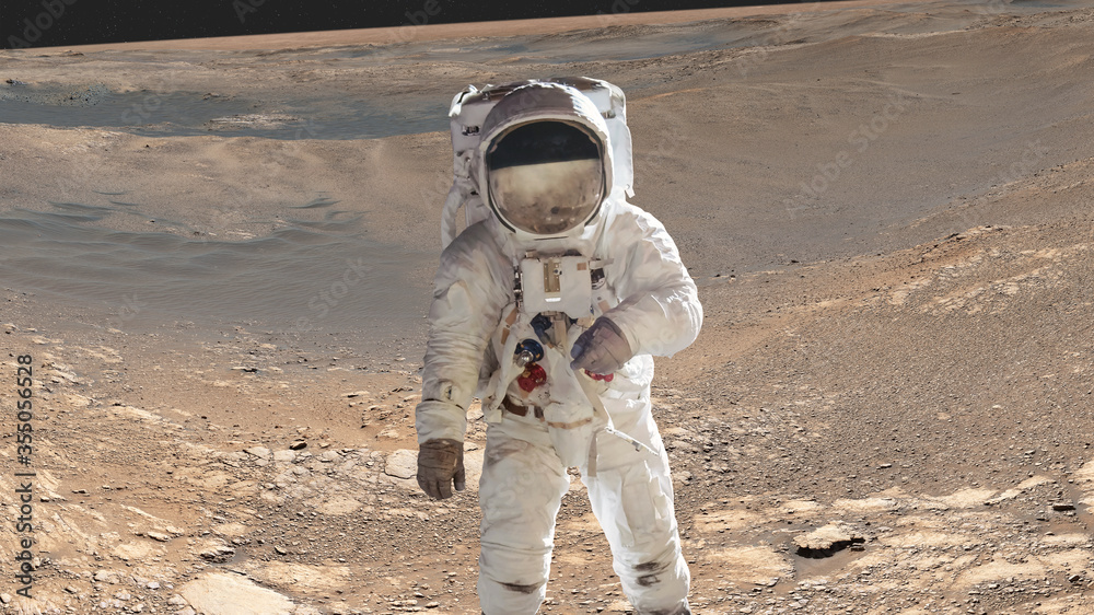 Wall mural single space astronaut with black glas on the helmet on the mars surface. elements of this image wer