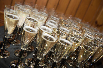 champagne glasses on a tray