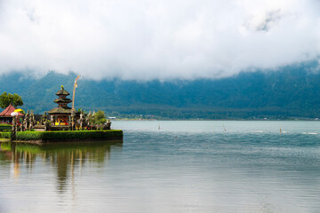 Fototapeta premium Pura Ulun Danu Bratan, Hindu temple on Bratan lake landscape, one of famous tourist attraction in Bali, Indonesia