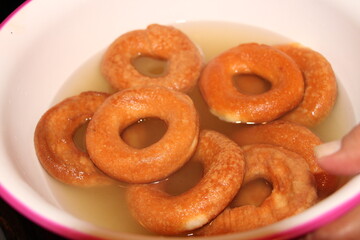 Preparing rosquilla en miel, dessert in Honduras, typical food