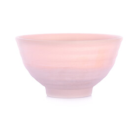 Simple clay bowl on white background. Traditional craft.