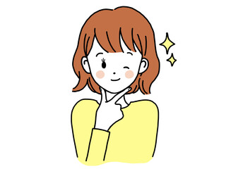 顔に手を当ててウィンクしながら自慢顔をする女性