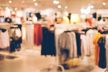 Abstract blur and defocused clothing department store in shopping mall interior for background