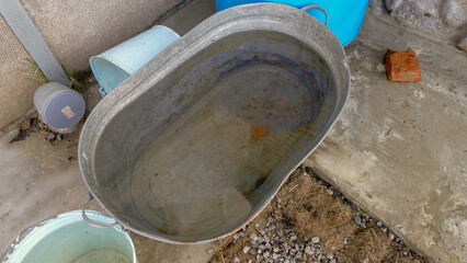 a container filled with rain water