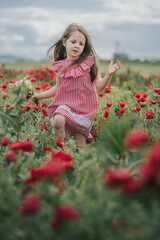 Cute child playing on the field 