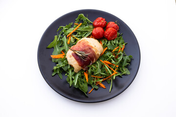 Chicken breasts filled with creamy parmigiana stuffing and wrapped in prosciutto