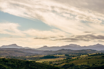 Obraz na płótnie Canvas panorama of fields, mountains and sky in africa