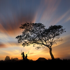 silhouette of a man with a tree