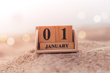 Wood brick block show date and month calendar of 1st January or New year day.