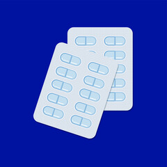 top view of two tablets strips foil packed in ten tablets isolated on blue background