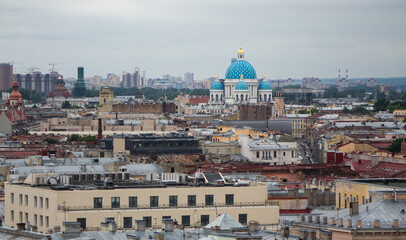 Fototapeta na wymiar View on Saint Petersburgs' roofs from a cathedral height. Saint Petersburg in different directions.
