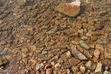 stone in water