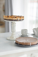 Sweet tasty cheesecake on table