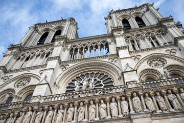 Fototapeta na wymiar Notre Dame de Paris in a beautiful summer day. Perspective of the front facade