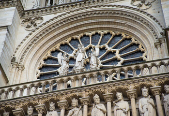 Obraz premium Notre Dame de Paris in a beautiful summer day. Close up onto huge rose window