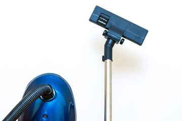 Cleaning concept - vacuum cleaner on white background close up