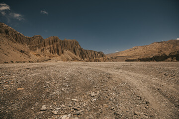 Upper mustang - Kingdom of Lo. Canyon in ancient Tibet. Sandstone massif in Nepal. trekking rote. high quality photo. Anapurna area. wild place.close territory.
