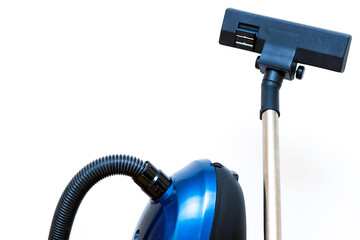 Cleaning concept - vacuum cleaner on white background close up