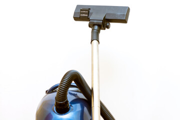 Cleaning concept - vacuum cleaner on white background close up