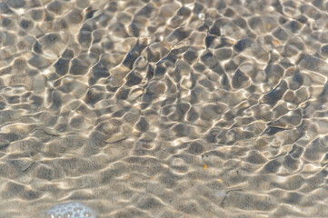 Fototapeta na wymiar Water Ripple Patterns at Beach