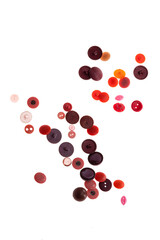 Wallpaper of various size and color vintage buttons. White isolated background.  Colorful background for illustration.  Top view.