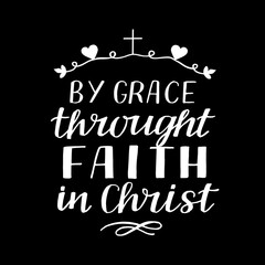 Hand lettering By grace throught faith in Christ on black background.