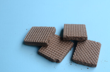 cocholate wafers with a blue background
