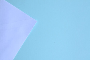 top view of paper on a blue background, design