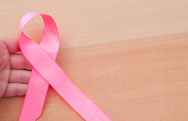 Pink ribbon cancer awareness. Modern style logo animation for october month awareness campaigns....