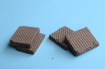 cocholate wafers with a blue background
