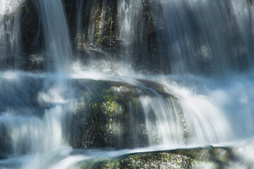 Broad Brook cascades over a waterfall in East Windsor, Connecticut.